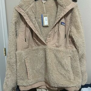 Patagonia Sweater style with hoodie. NWT. Never worn